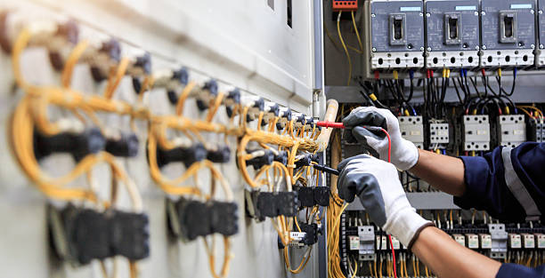 Professional Electrician technician working in Ozark, AR